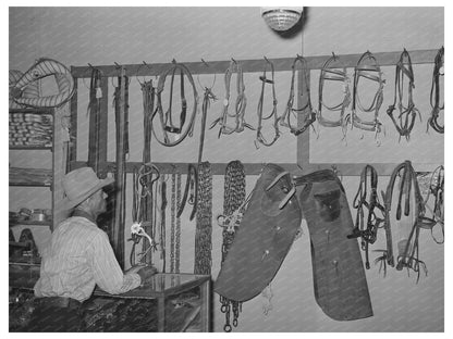 Cowboy Examining Ranch Supplies in Alpine Texas 1939 - Available at KNOWOL