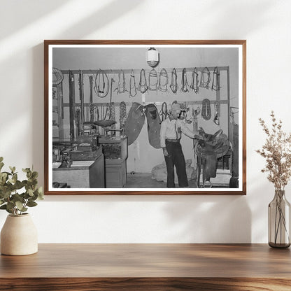 Cowboy Examining Saddle in Brewster County Texas 1939 - Available at KNOWOL