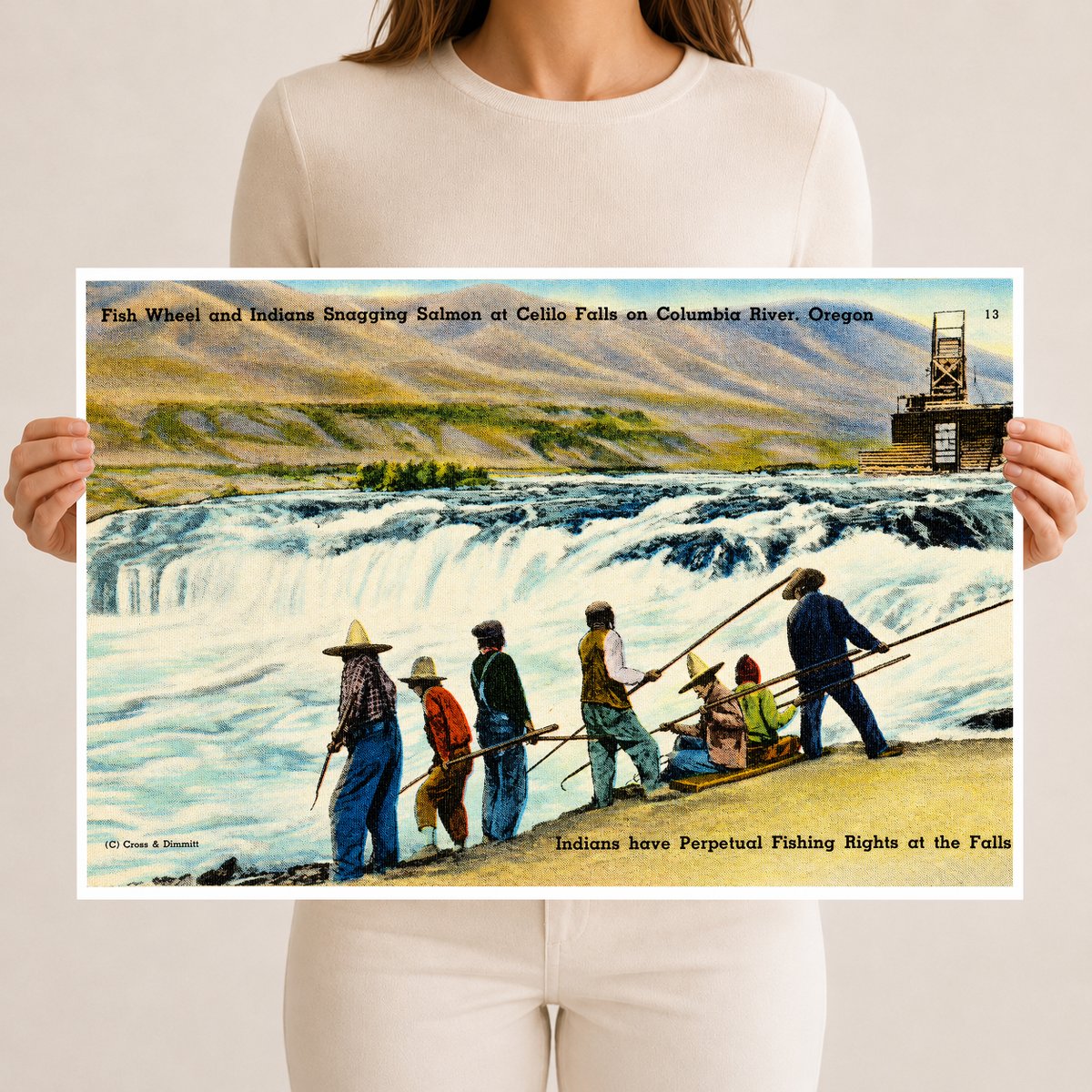 Columbia River, OR: Fish Wheel and Indian Snagging Salmon at Celilo Falls on Columbia River, Oregon. Indians have perpetual fishing rights at the falls.