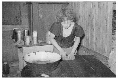 Daughter of Laborer in Kitchen McIntosh County 1939 - Available at KNOWOL