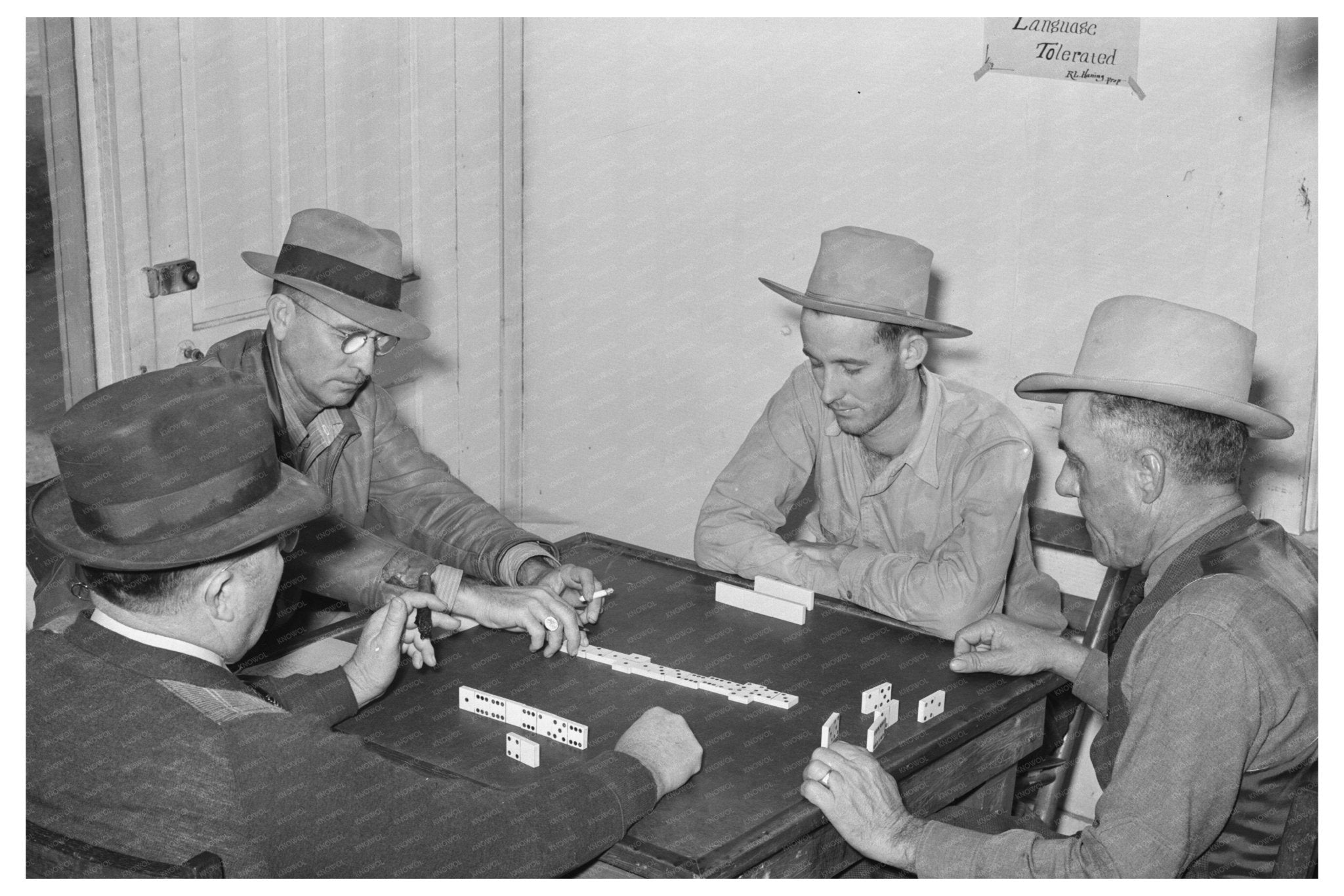 Domino Game in Beer Parlor Sebastian Texas February 1939 - Available at KNOWOL