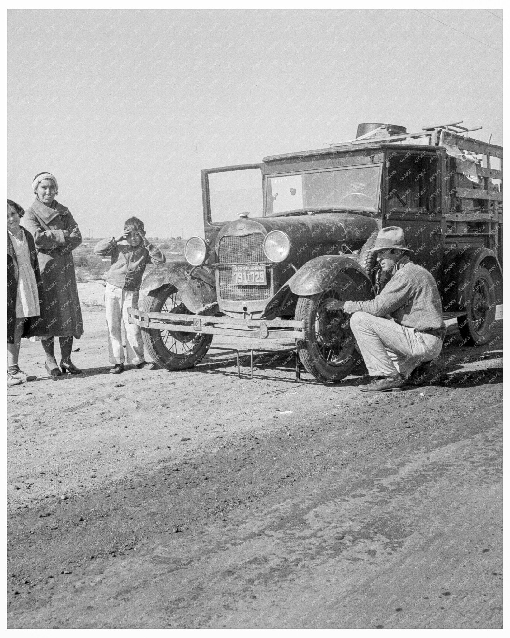 Drought Refugee Family from McAlester Oklahoma California Cotton Harvest 1936 - Available at KNOWOL