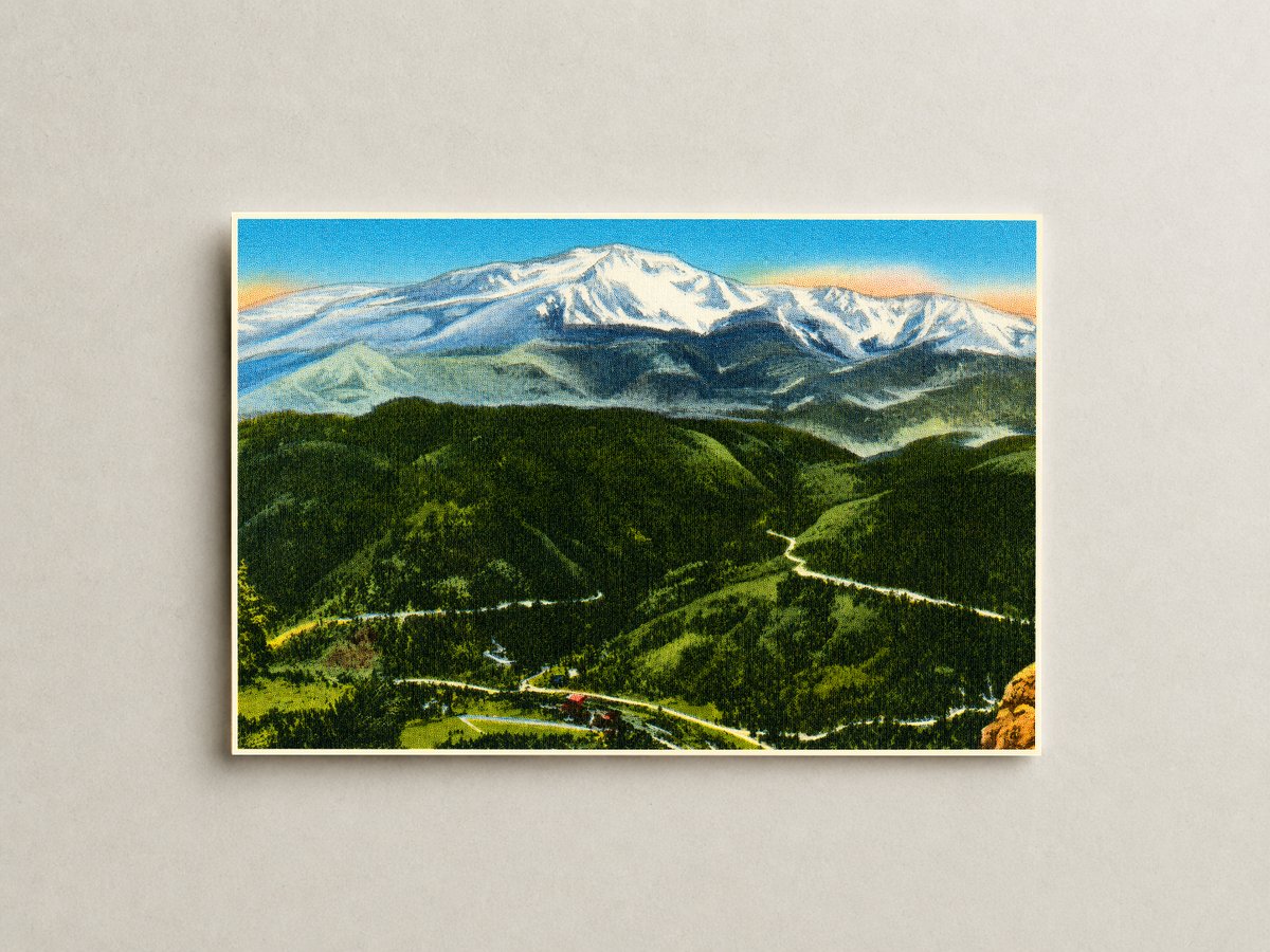 Pikes Peak, CO: Pikes Peak, alt. 14,110 feet from Rampart Range Road, showing cascade and beginning of Pikes Peak Auto Highway.