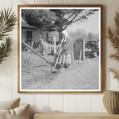 Elderly Woman Hoeing Garden in Gibbs City Michigan 1937 - Available at KNOWOL