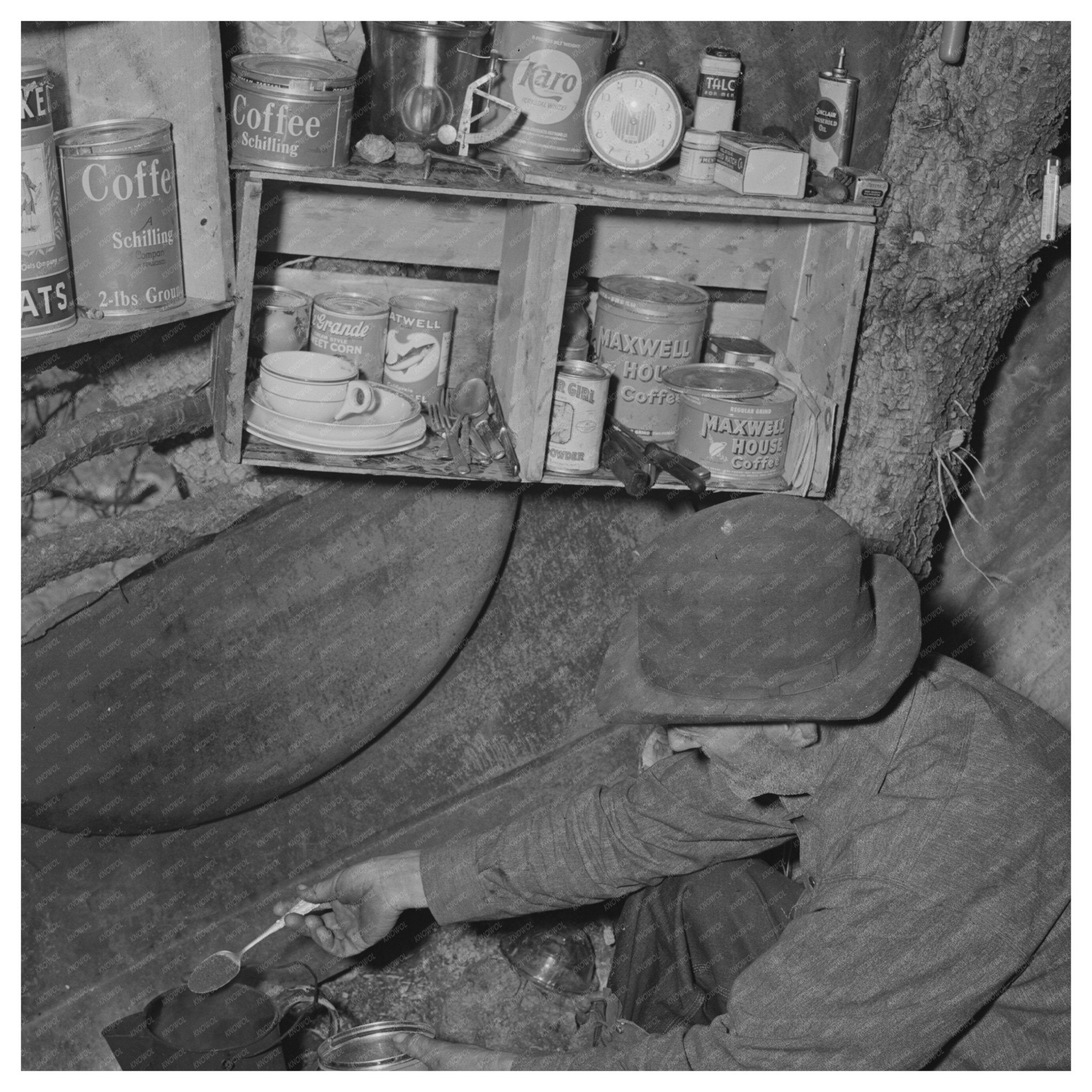 Eugene Davis Making Coffee in Pinos Altos New Mexico 1940 - Available at KNOWOL