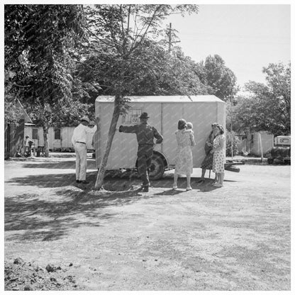 Family Inspecting House Trailer in California 1939 - Available at KNOWOL