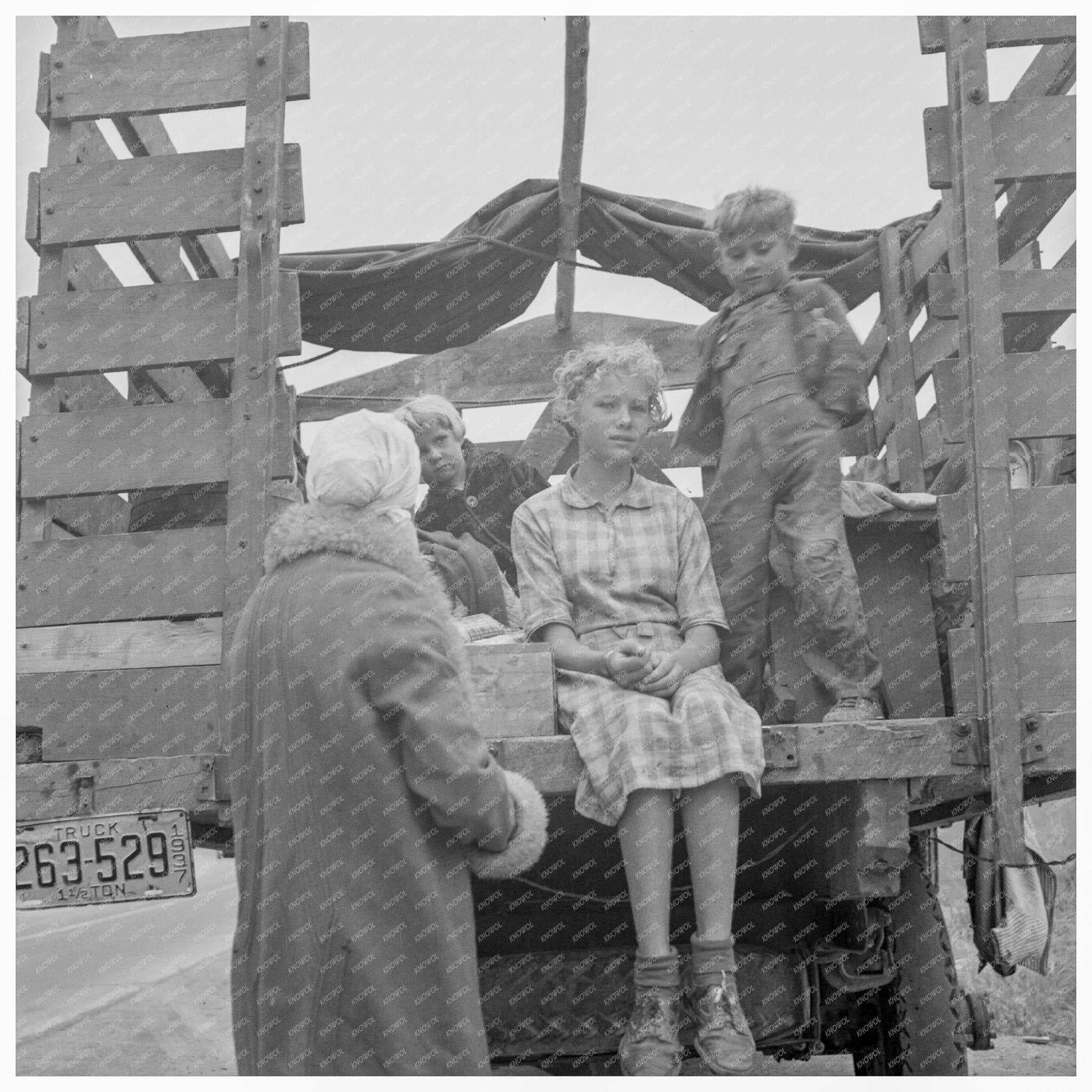 Family of Ex - Sharecroppers Traveling in California 1937 - Available at KNOWOL