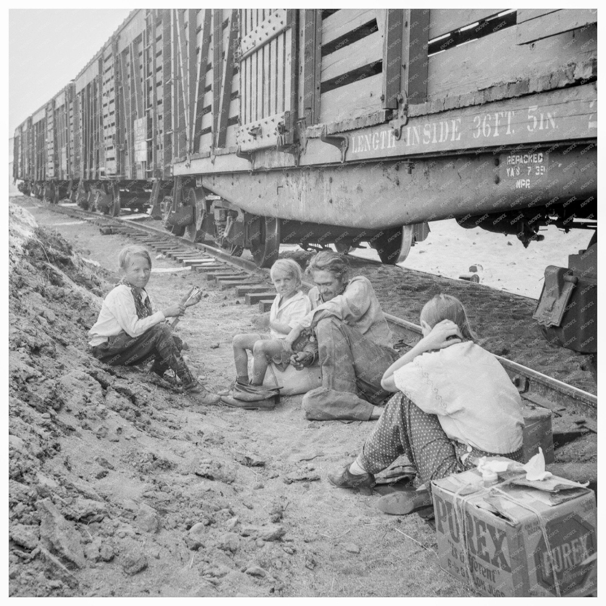 Family Traveling by Freight Train in Toppenish 1939 - Available at KNOWOL