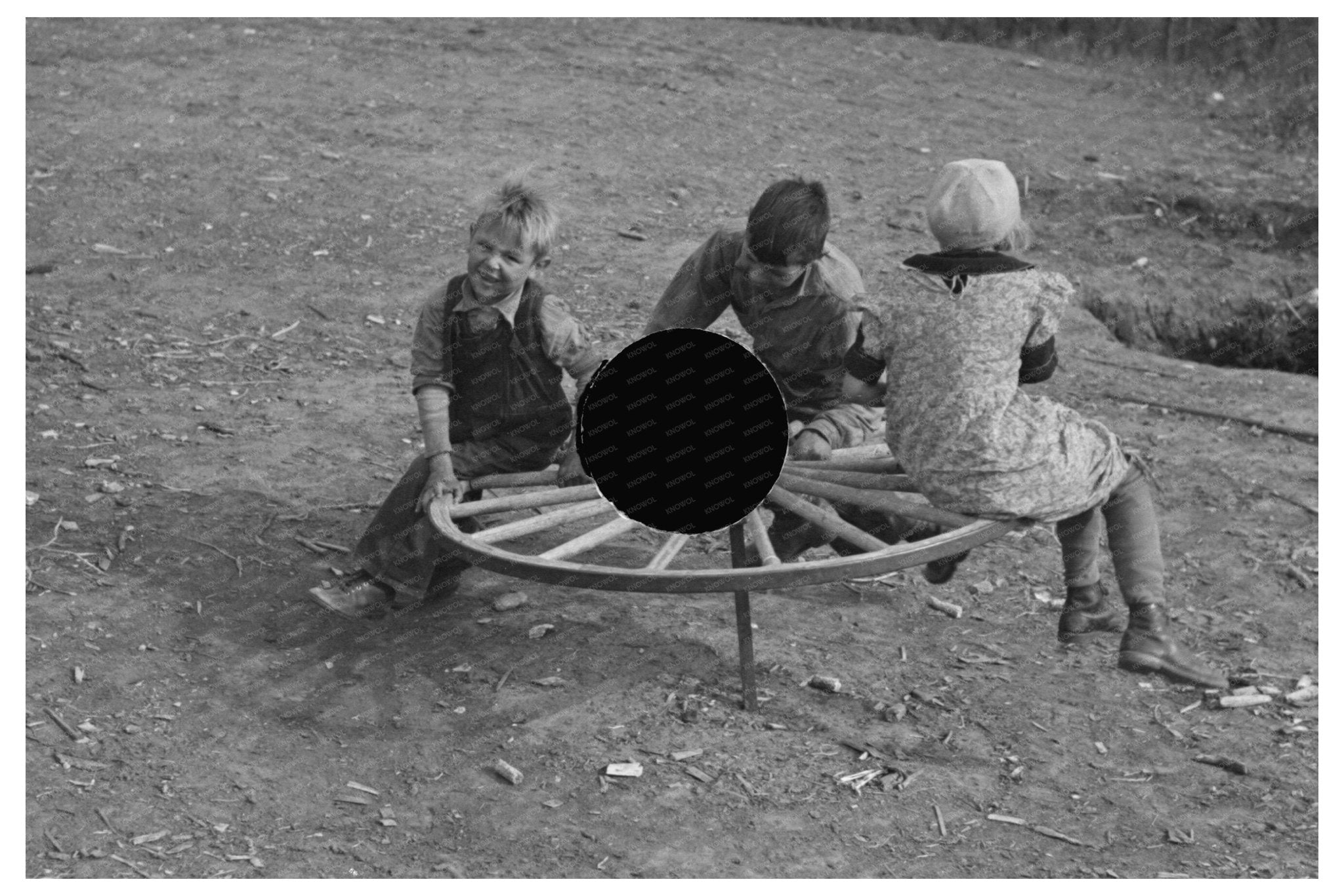 Farm Children on Merry - Go - Round Williams County 1937 - Available at KNOWOL