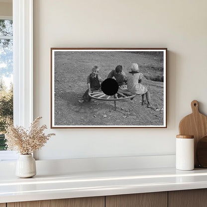 Farm Children on Merry - Go - Round Williams County 1937 - Available at KNOWOL