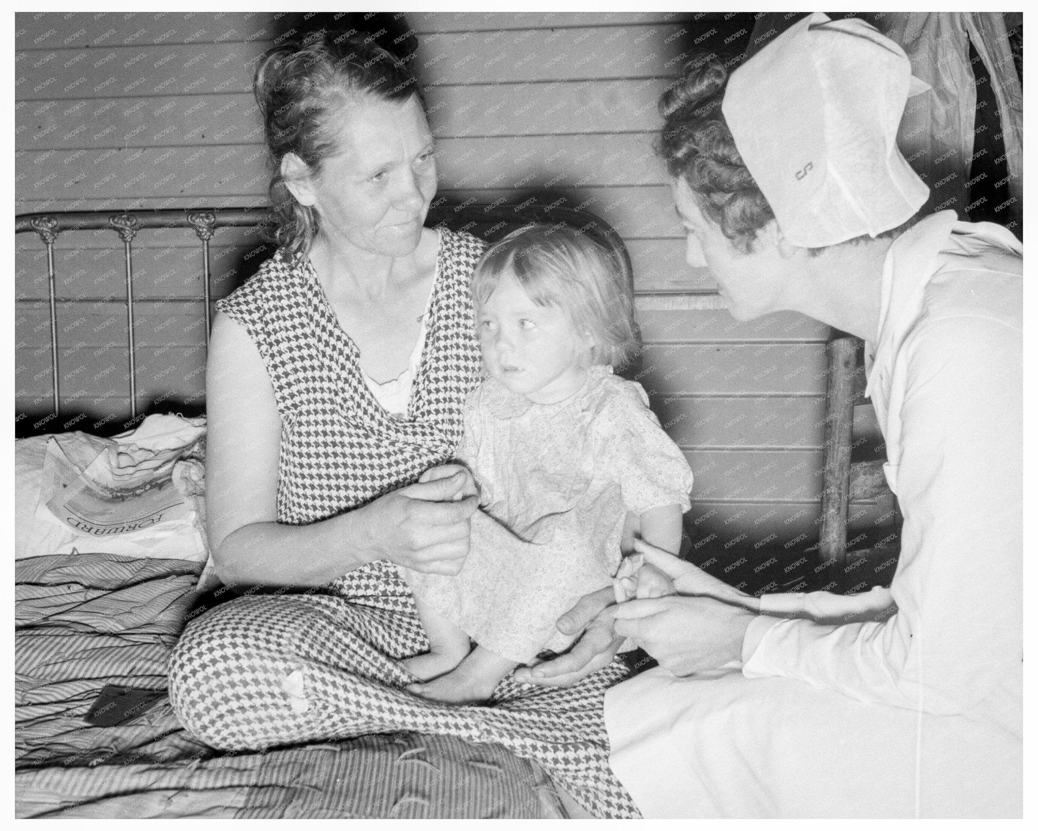 Farm Security Administration Nurse Examines Sick Baby 1939 - Available at KNOWOL