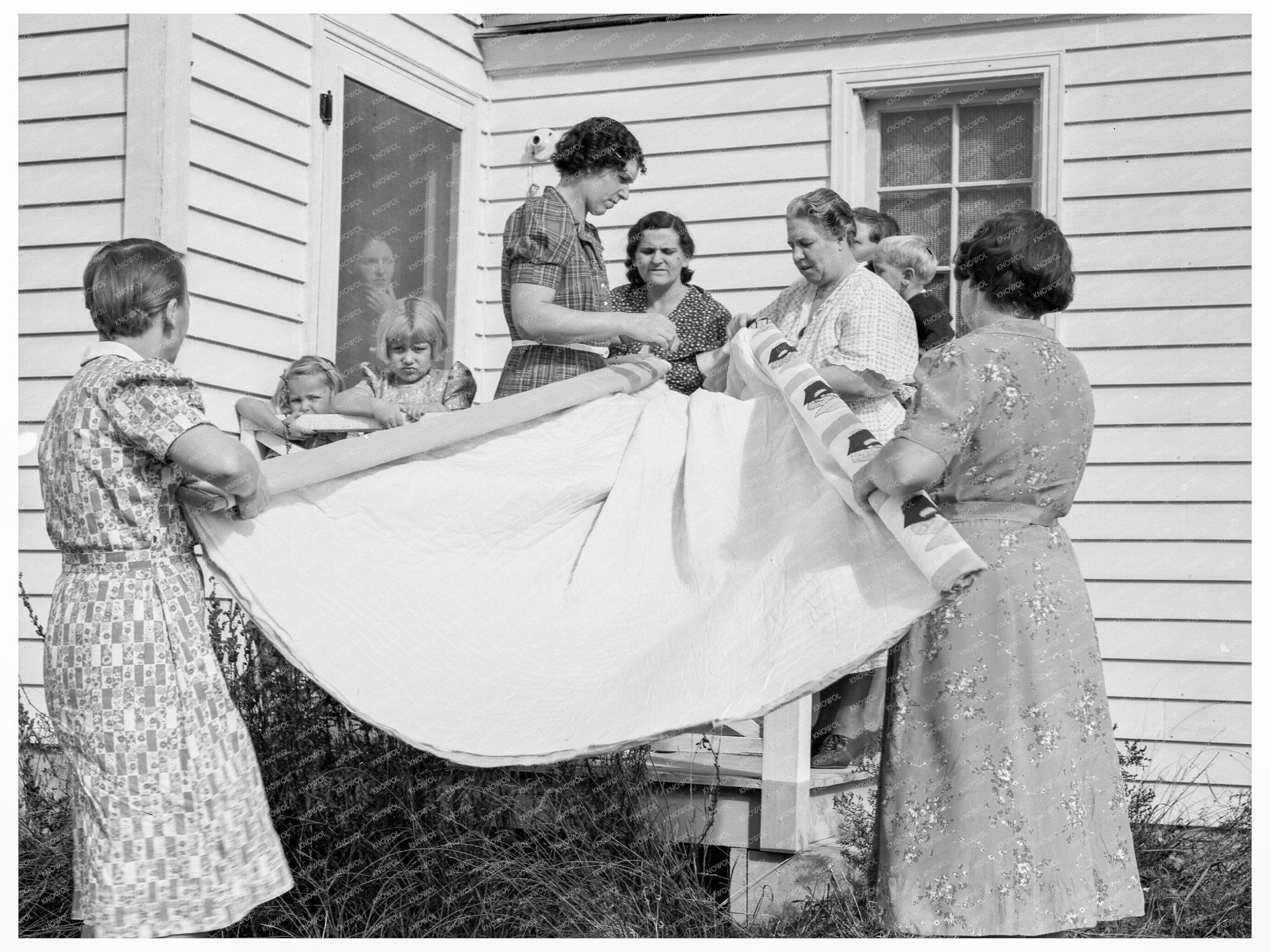 Farm Women Rolling Quilt in Yamhill County Oregon 1939 - Available at KNOWOL