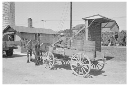 Farmer at Liquid Feed Station Owensboro Kentucky May 1938 - Available at KNOWOL