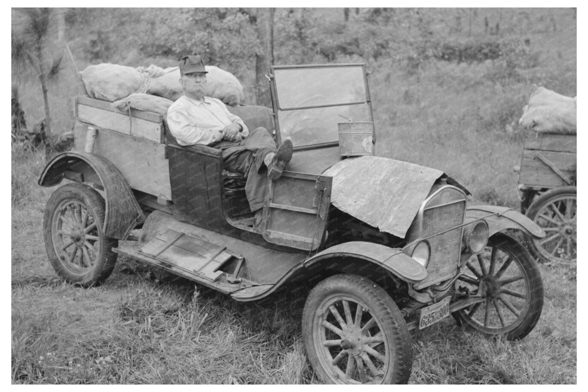 Farmer in Broken Ford Truck Amite City Louisiana 1938 - Available at KNOWOL