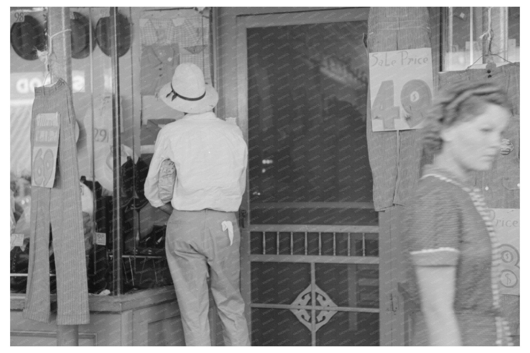 Farmer in Front of Dry Goods Store Steele Missouri 1938 - Available at KNOWOL