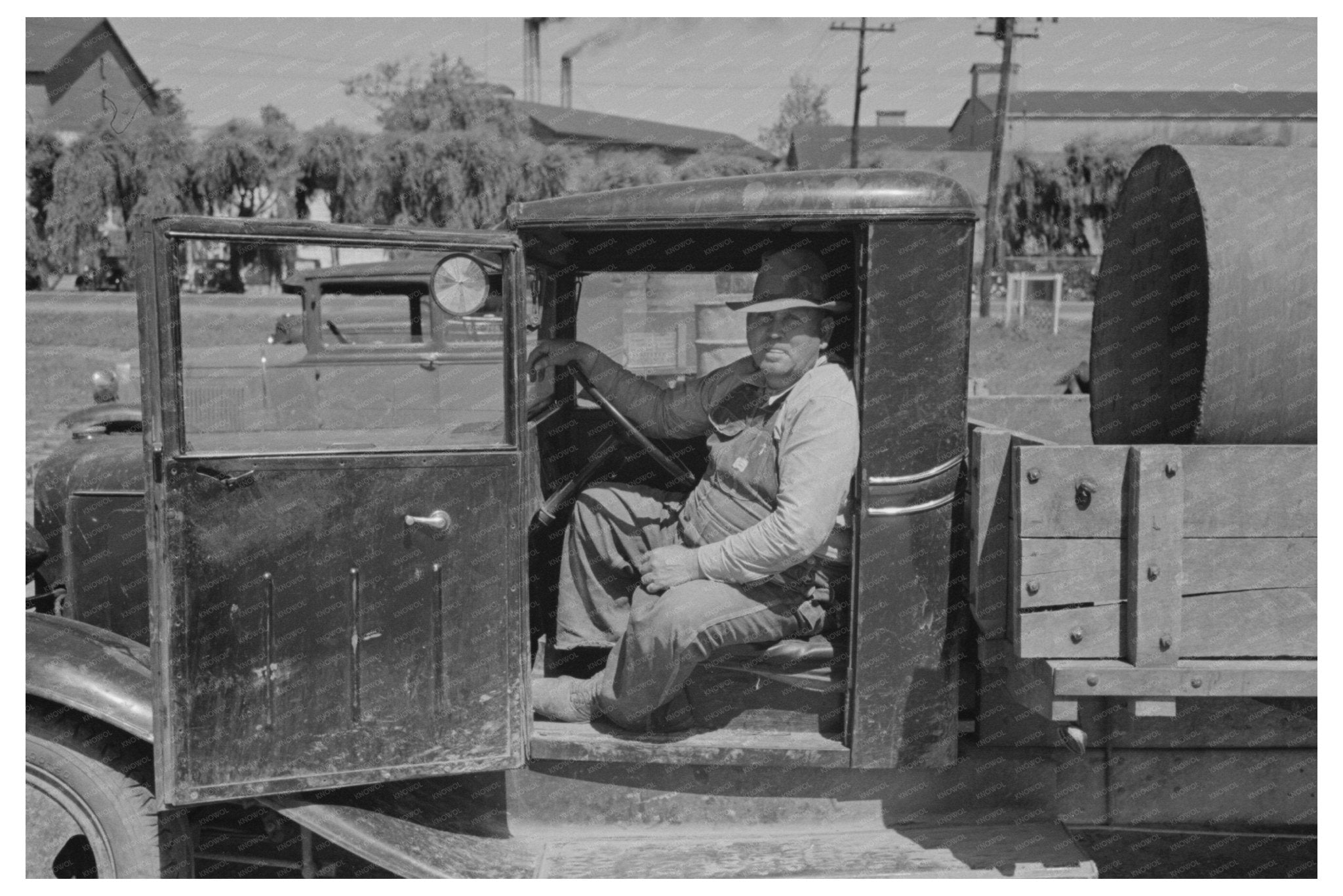 Farmer in Truck at Liquid Feed Station Owensboro 1938 - Available at KNOWOL