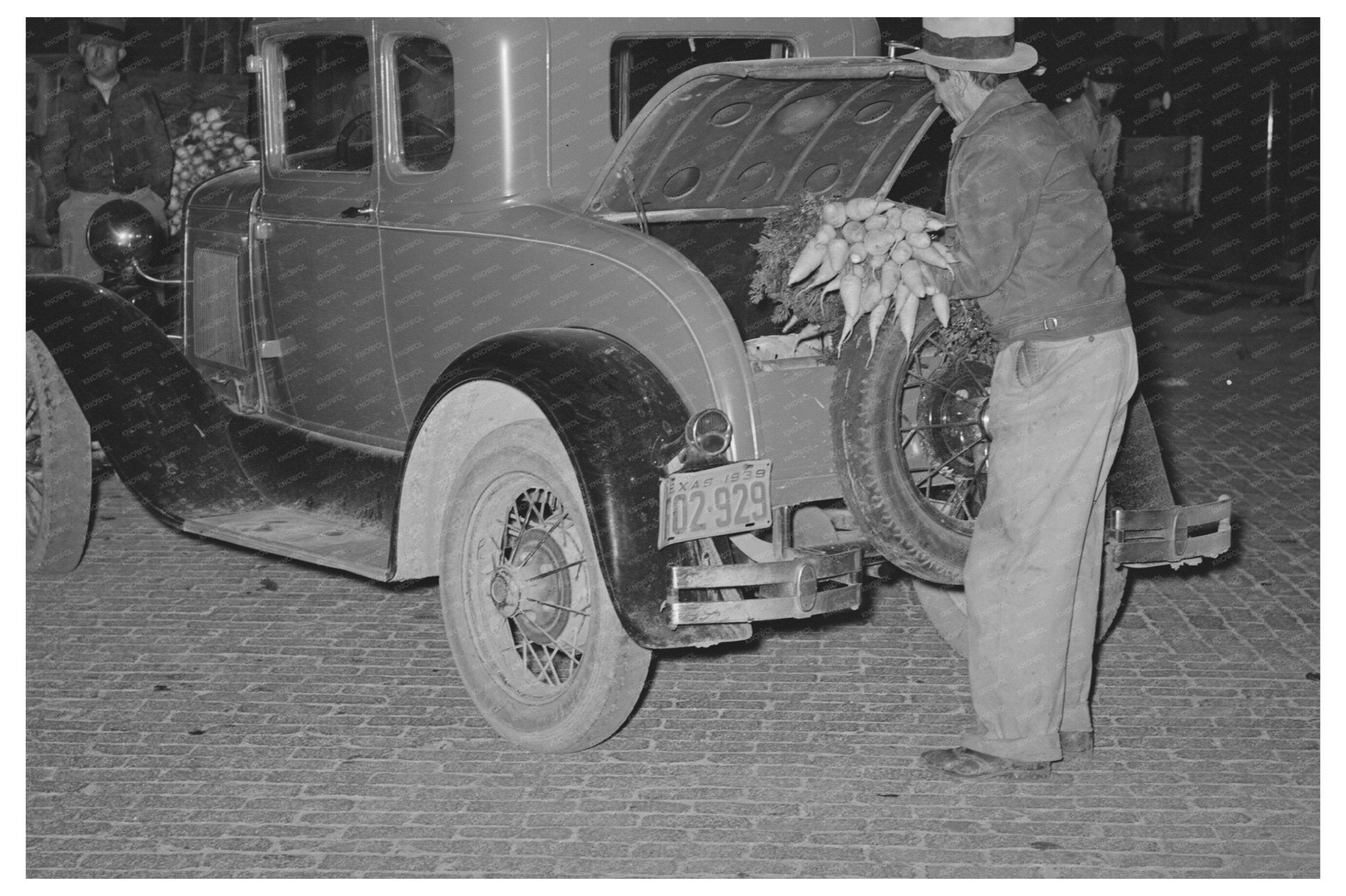 Farmer Loading Vegetables at San Angelo Market 1939 - Available at KNOWOL