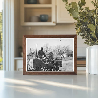 Farmer Repairs Wagon Wheel in Depew Oklahoma 1940 - Available at KNOWOL