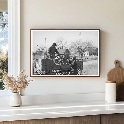 Farmer Repairs Wagon Wheel in Depew Oklahoma 1940 - Available at KNOWOL