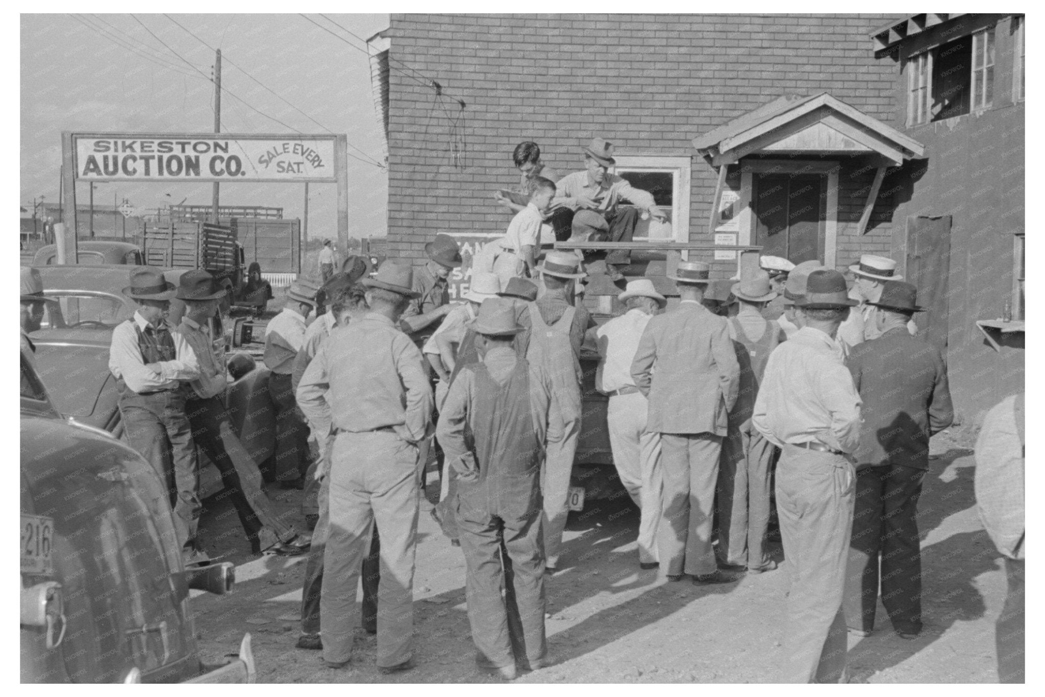 Farmers at Peach Auction Sikeston Missouri May 1938 - Available at KNOWOL