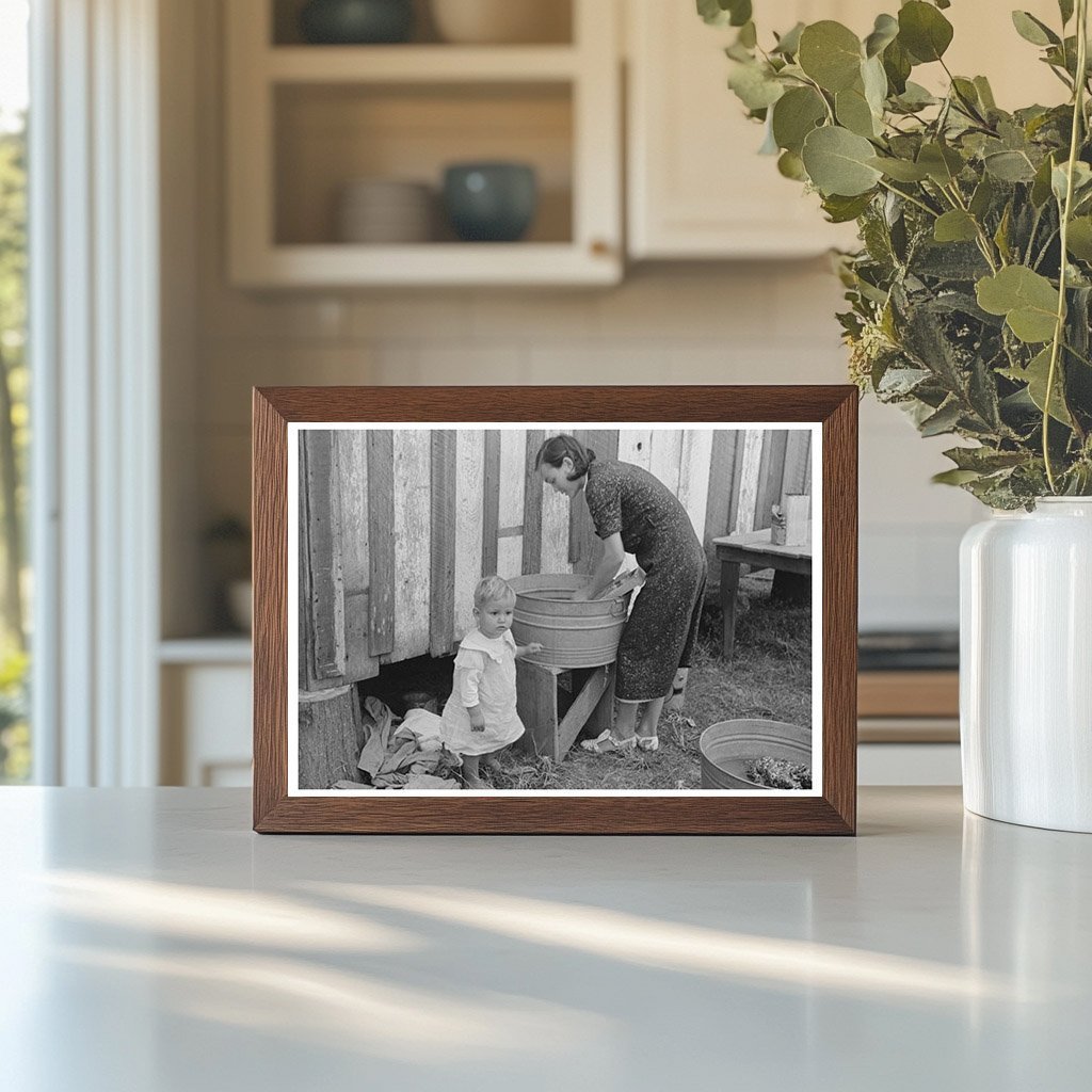 Farmers Wife Doing Laundry with Son November 1938 - Available at KNOWOL