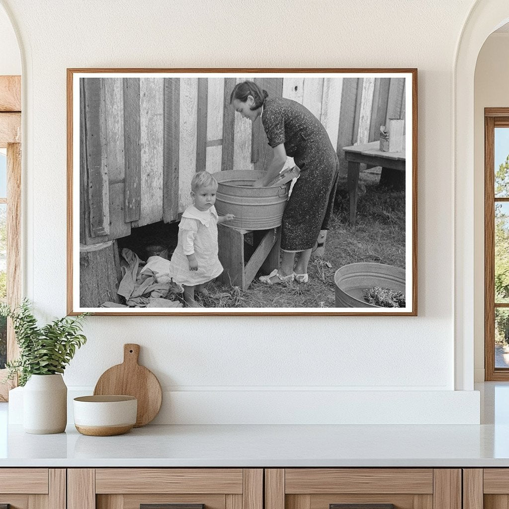 Farmers Wife Doing Laundry with Son November 1938 - Available at KNOWOL