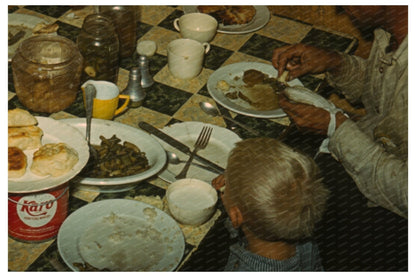 Faro Caudill Family Dining in Pie Town New Mexico 1940 - Available at KNOWOL