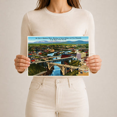 Spokane, WA: Air view of Spokane Wash., showing its seven bridges and five waterfalls in the heart of the city