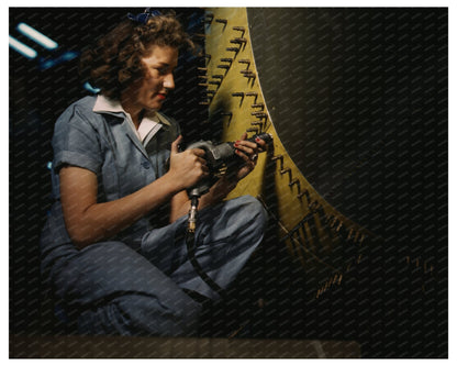 Female Worker Riveting Bomber October 1942 - Available at KNOWOL