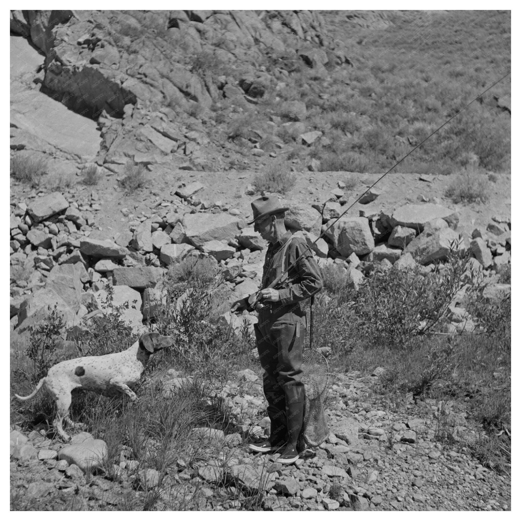 Fisherman and Dog on Salmon River Idaho August 1942 - Available at KNOWOL