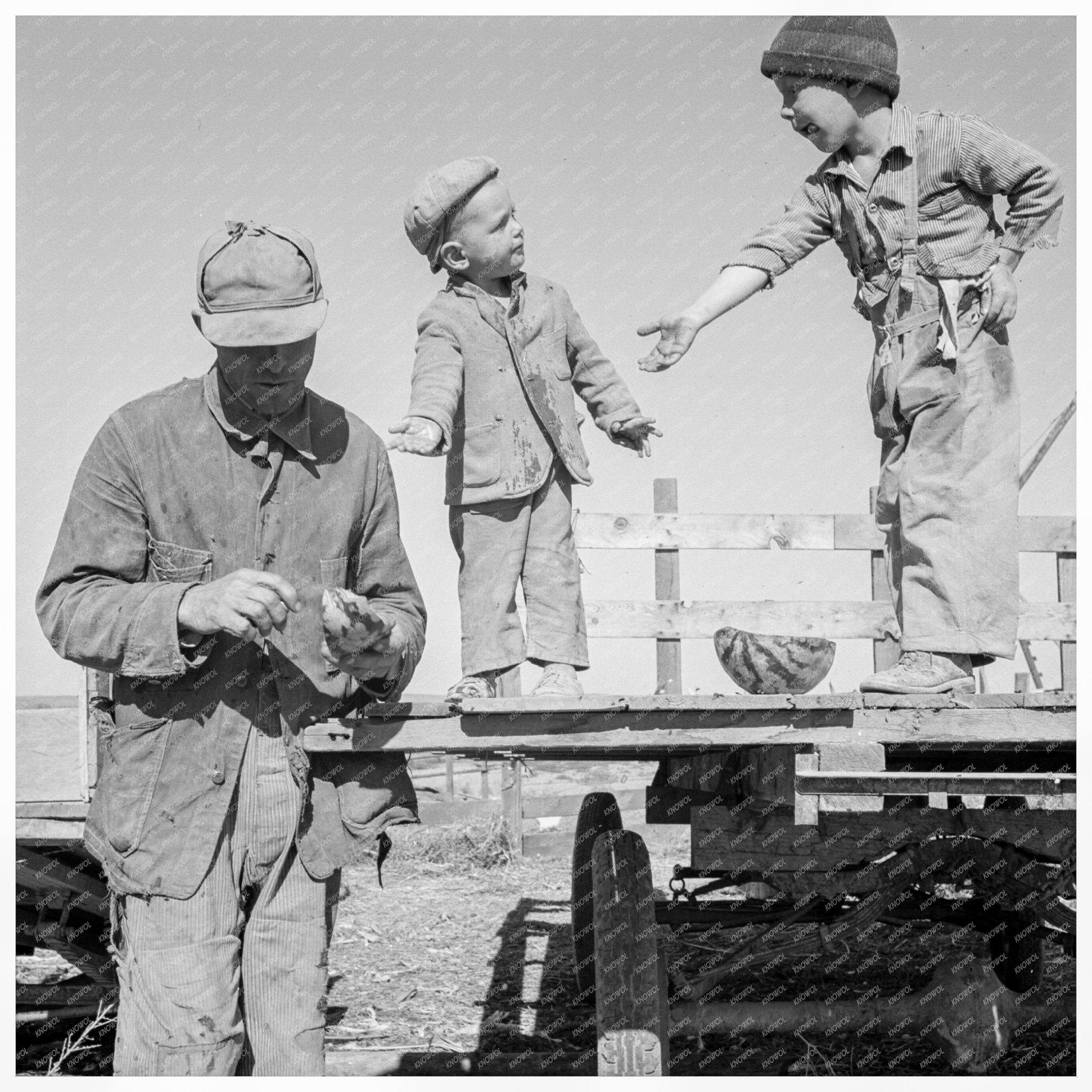 Franklin Schroeder and Boys Enjoy Watermelon 1939 - Available at KNOWOL