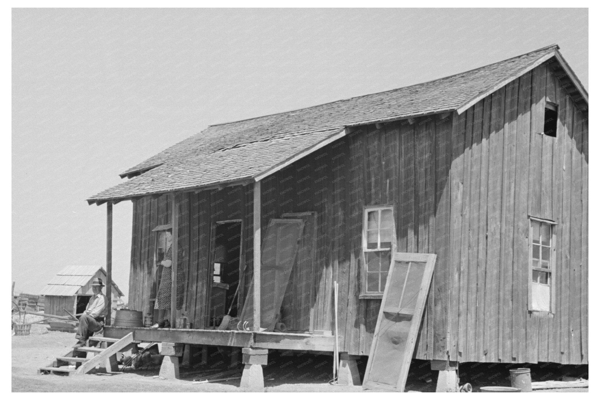 Front Porch of Sharecropper Cabin Southeast Missouri 1938 - Available at KNOWOL