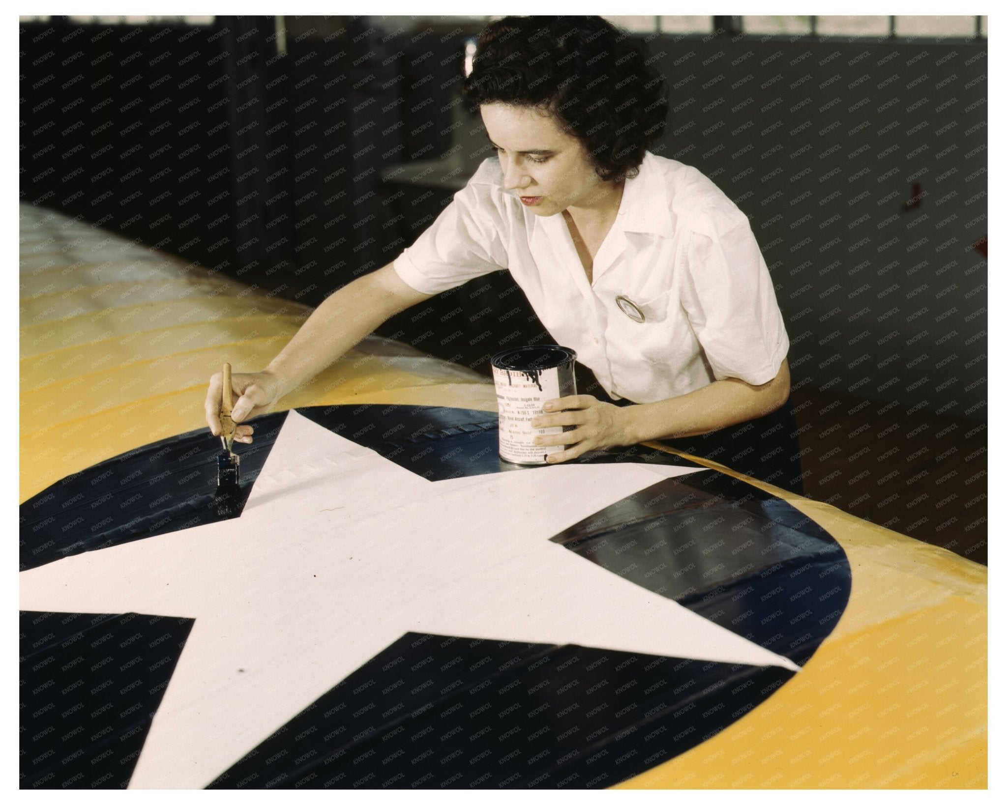 Grace Weaver Painting Insignia at Naval Air Base 1942 - Available at KNOWOL