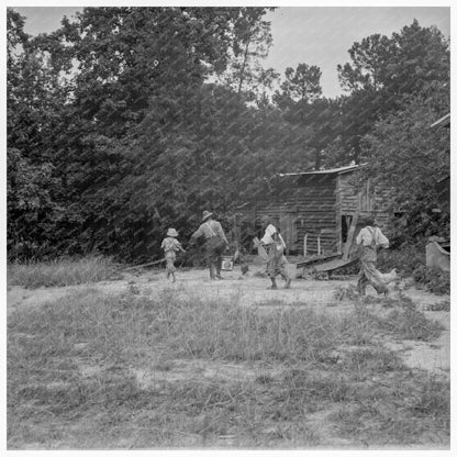 Grandfather and Children Feeding Pigs Granville County 1939 - Available at KNOWOL