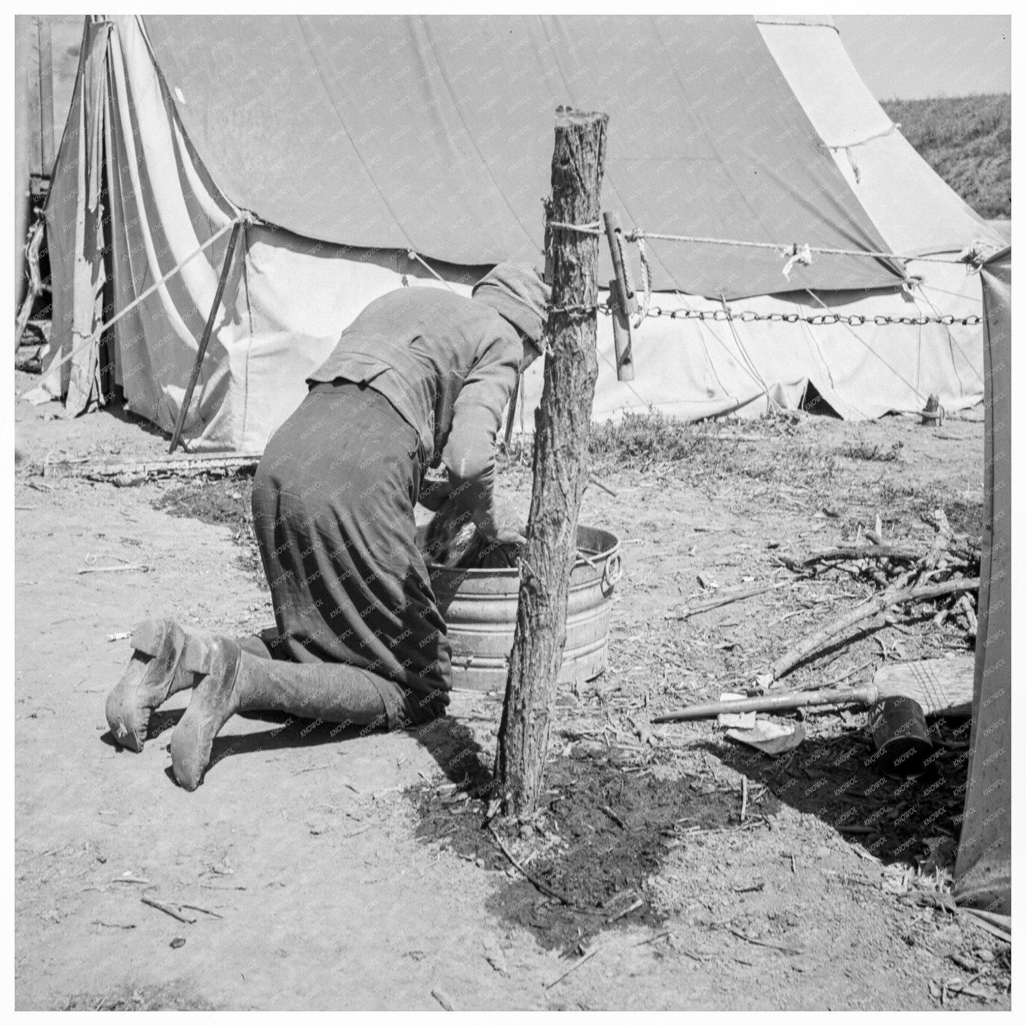 Grandmother Washing Clothes at Migrant Camp California 1939 - Available at KNOWOL