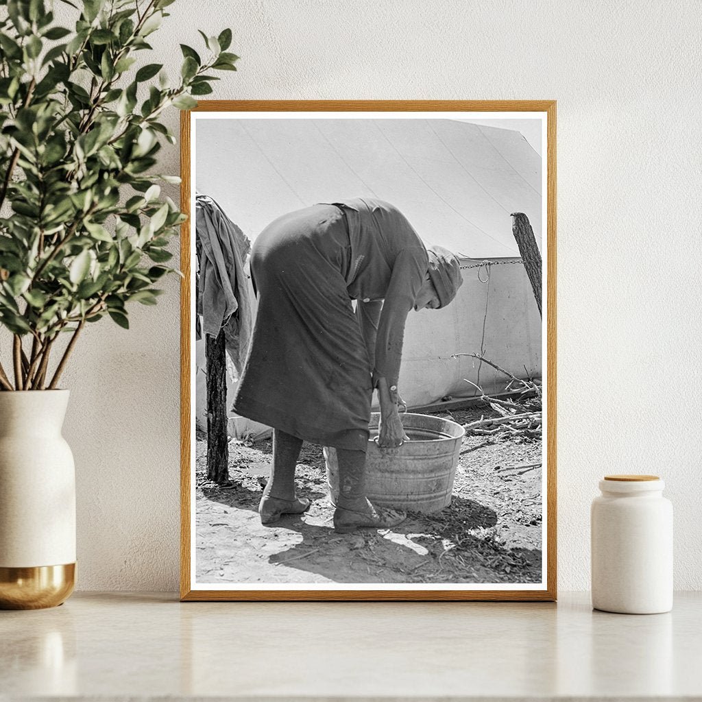 Grandmother Washing Clothes in Migrant Camp California 1939 - Available at KNOWOL