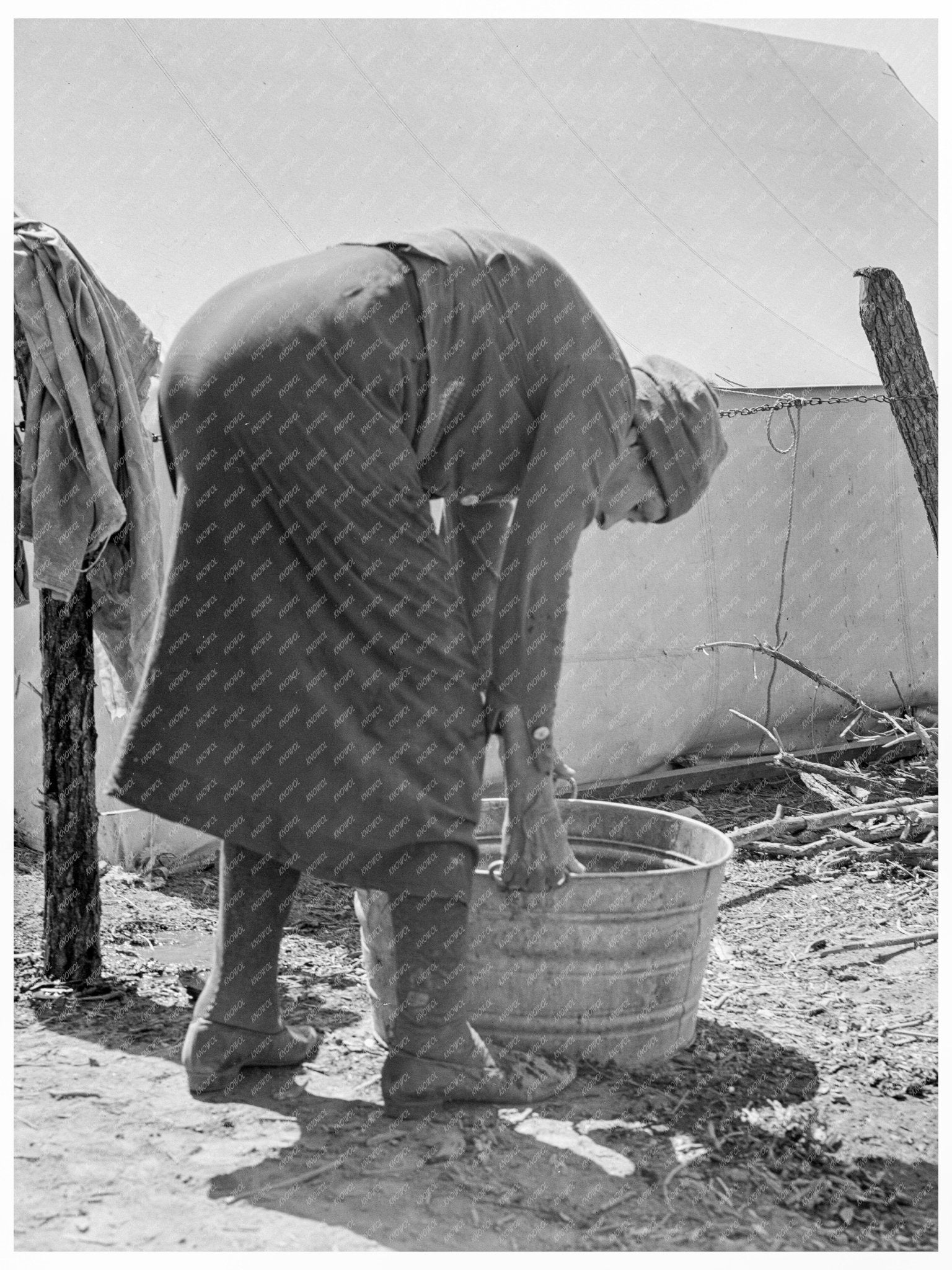 Grandmother Washing Clothes in Migrant Camp California 1939 - Available at KNOWOL