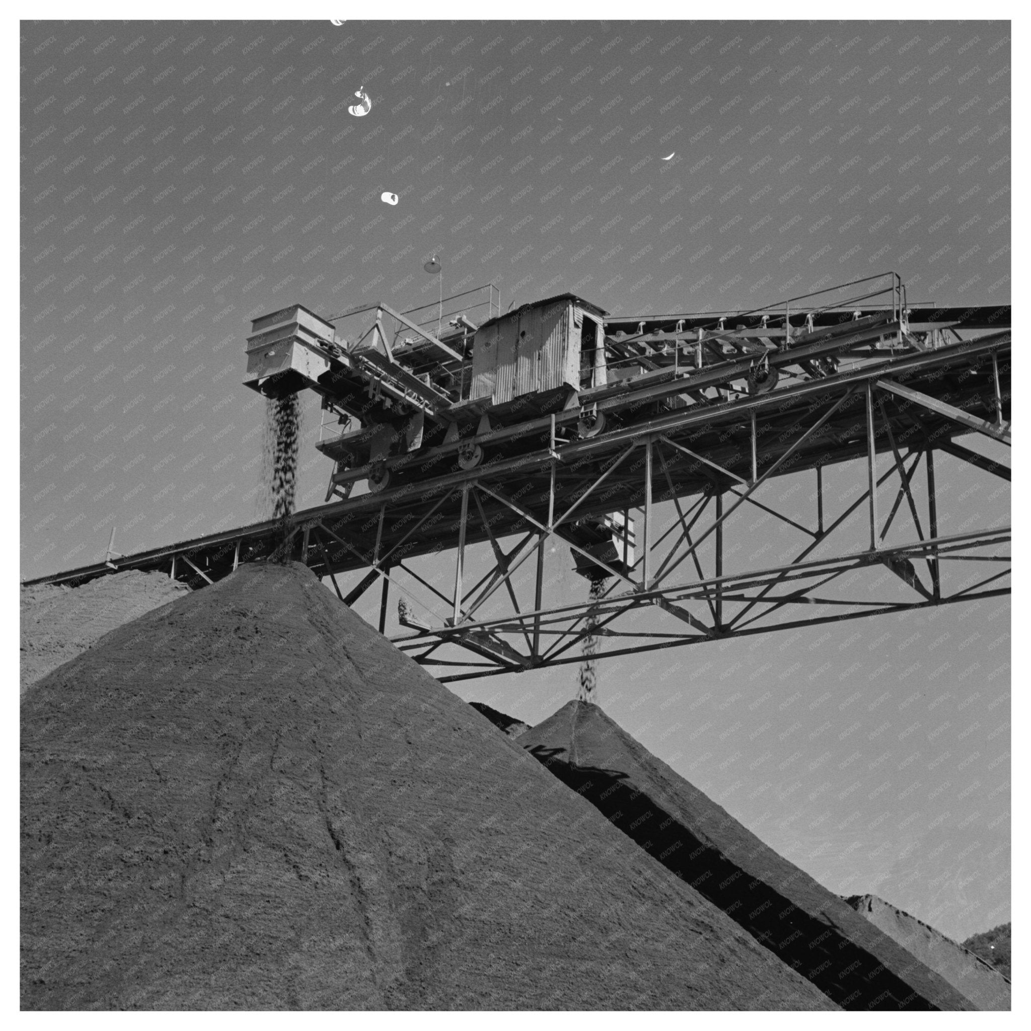 Gravel Under Conveyor Belt at Shasta Dam June 1942 - Available at KNOWOL