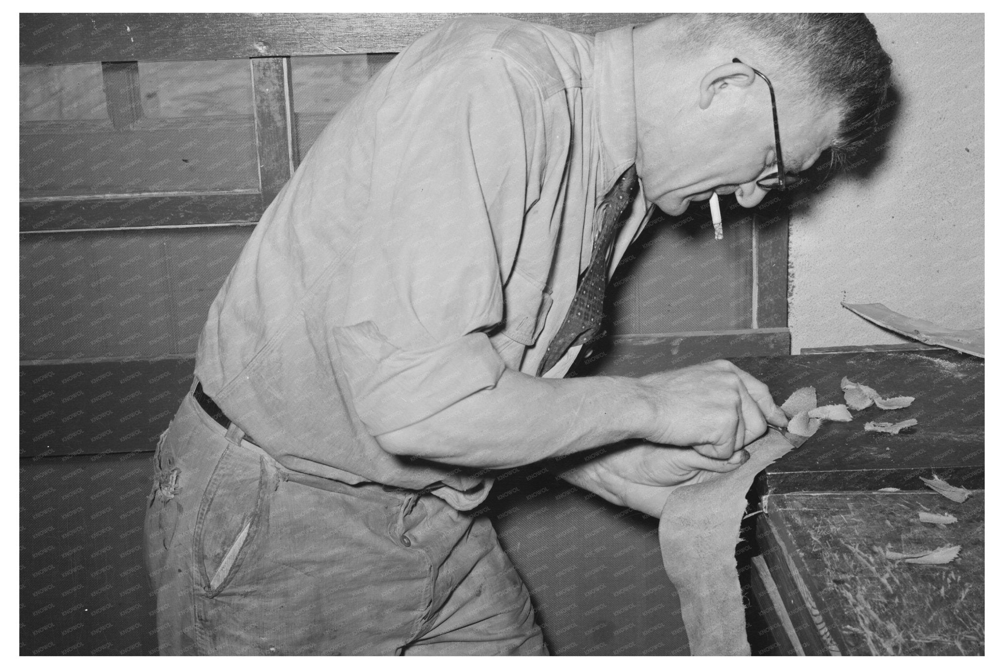 Hand Skiving Leather in Saddle Shop Alpine Texas 1939 - Available at KNOWOL