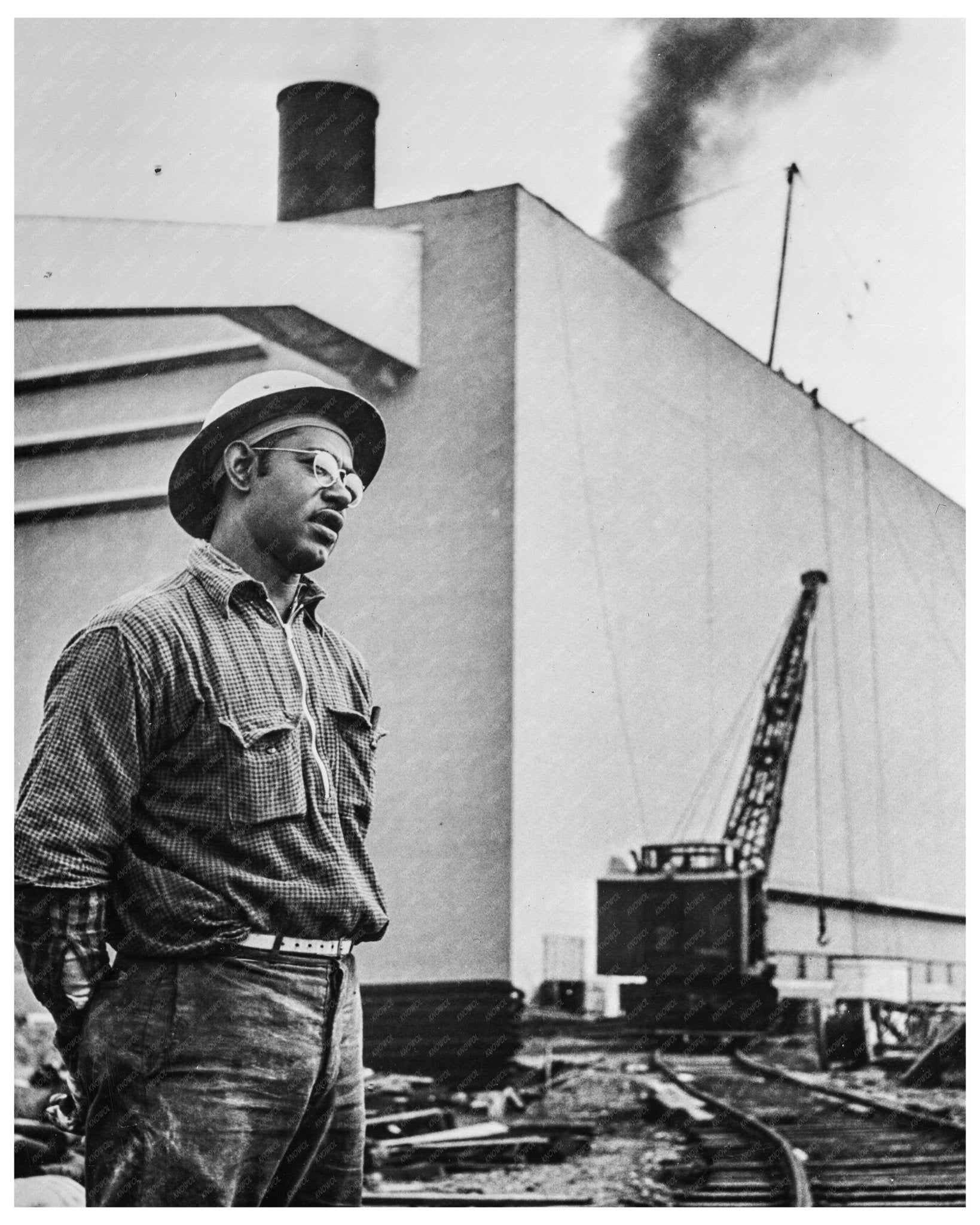 Herbert Smith Drill Operator at Watts Bar Dam Tennessee June 1942 - Available at KNOWOL