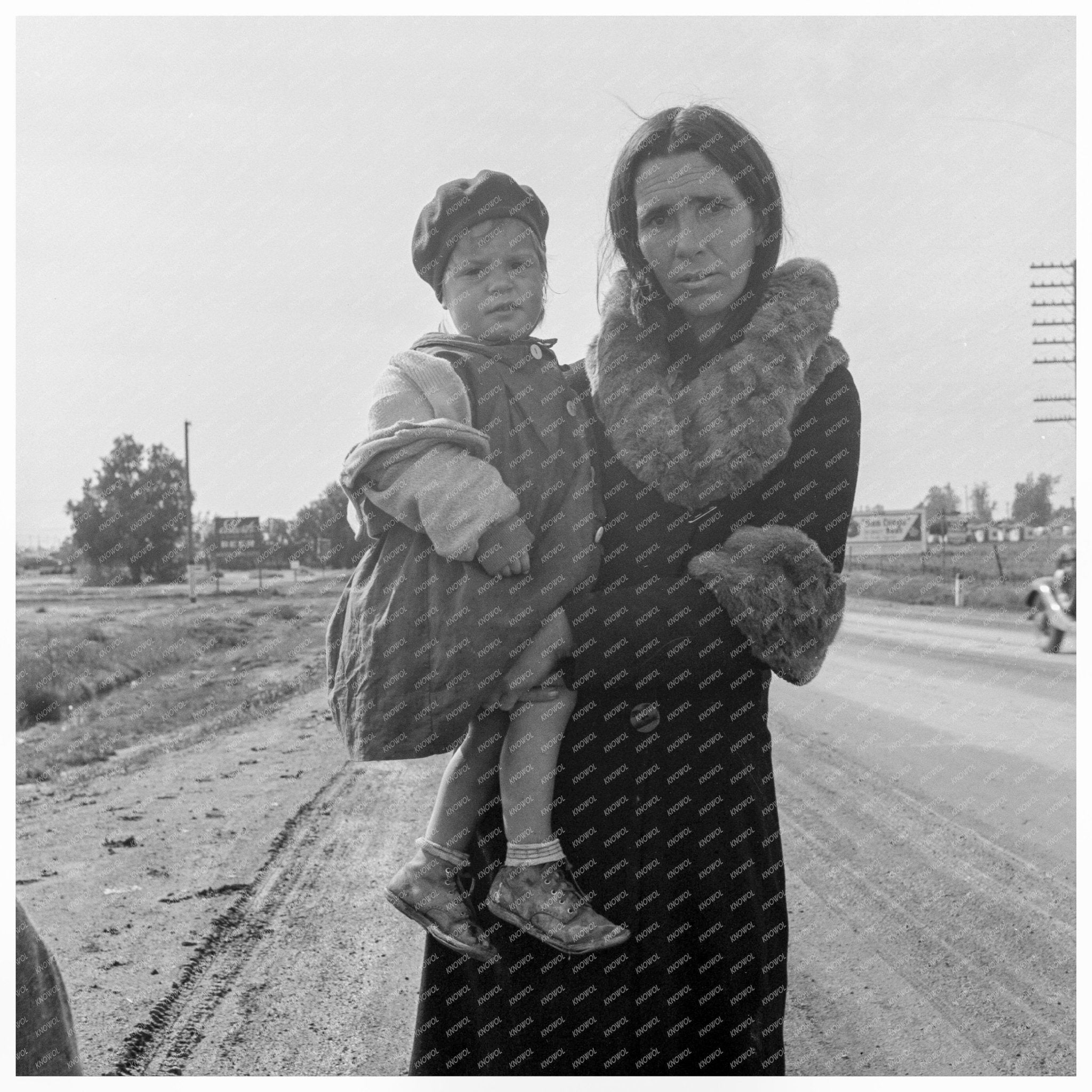 Homeless Mother and Child on U.S. 99 February 1939 - Available at KNOWOL