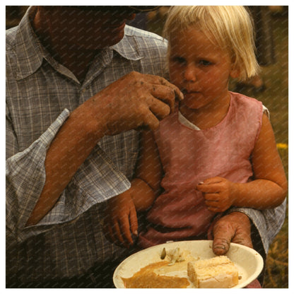 Homesteader Feeds Daughter at Pie Town Fair 1940 - Available at KNOWOL