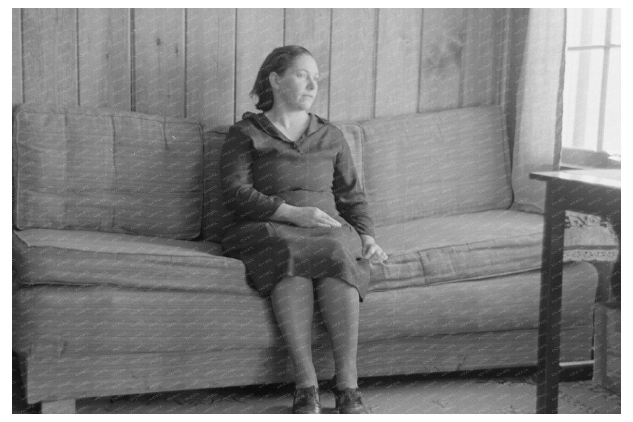 Homesteaders Wife on Sofa in Chicot Farms Arkansas 1939 - Available at KNOWOL