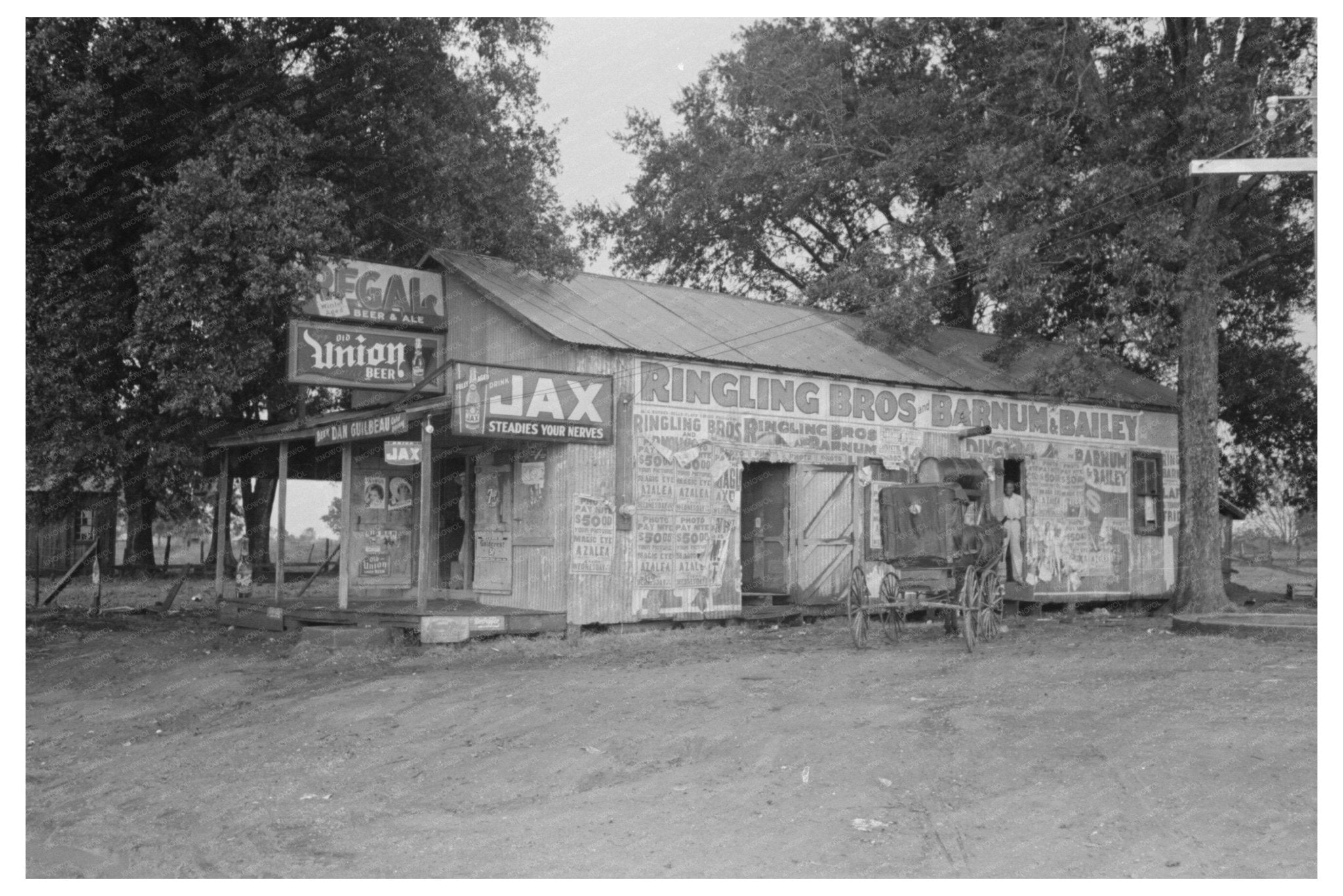 Horse and Buggy at General Store Lafayette Louisiana 1938 - Available at KNOWOL