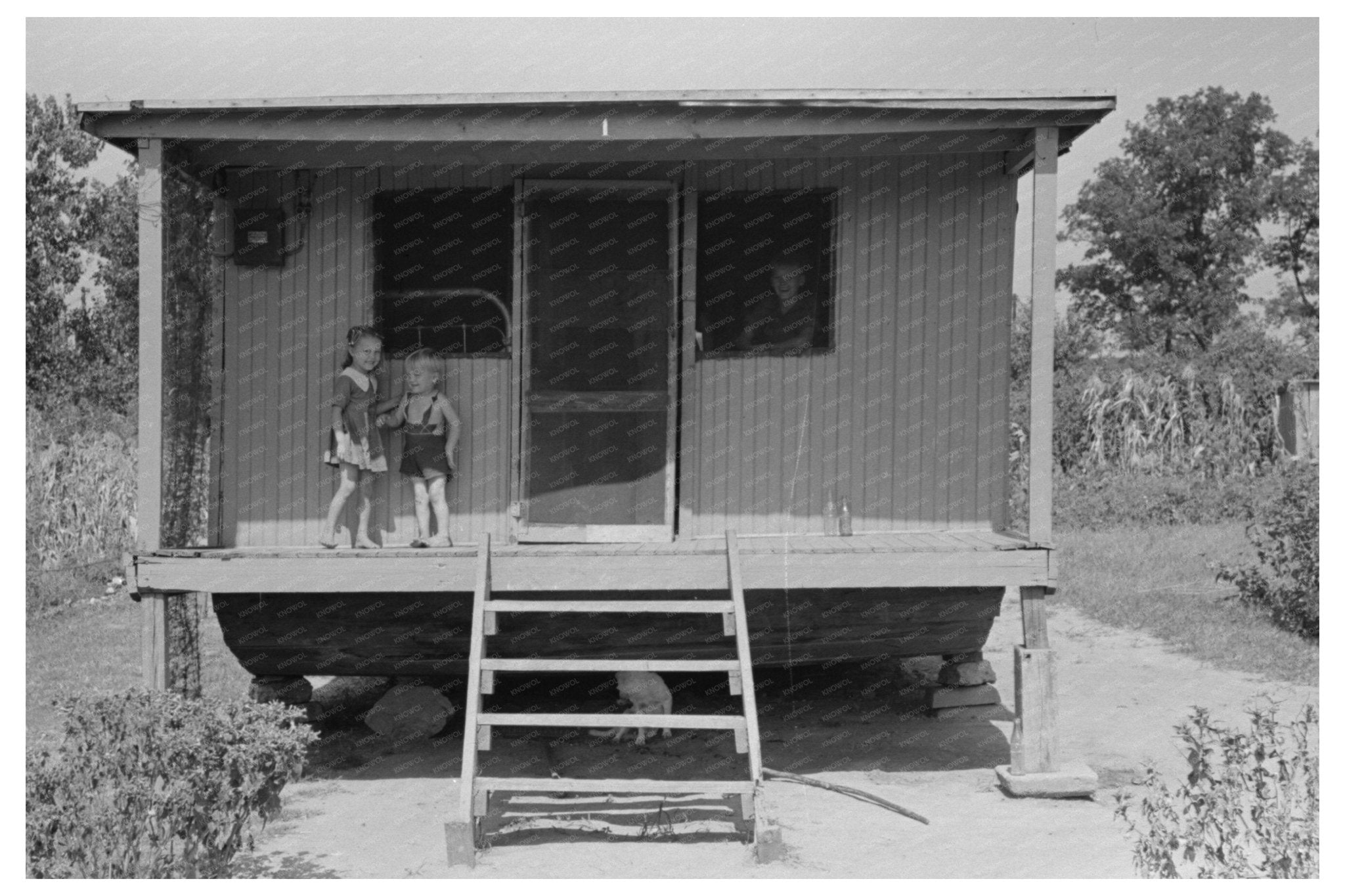 House on River Levee Caruthersville Missouri 1938 - Available at KNOWOL