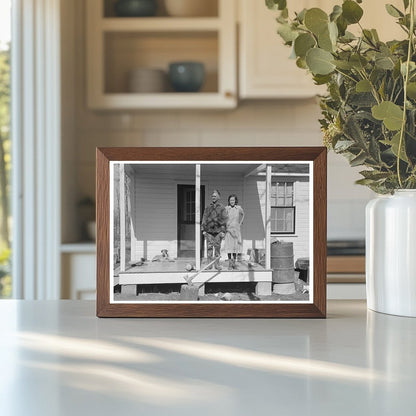 Husband and wife on porch in Chicot Farms Arkansas 1939 - Available at KNOWOL