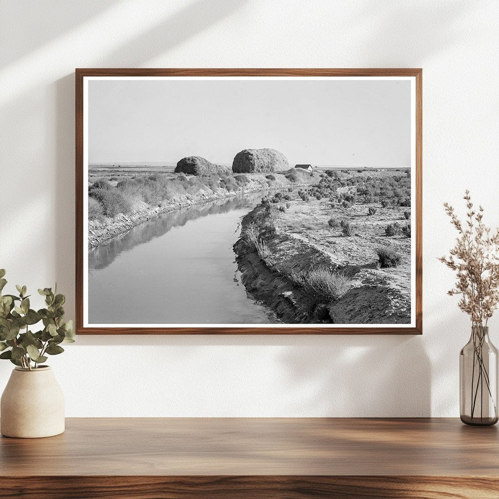 Irrigation Canal and Haystacks in Oregon 1939 - Available at KNOWOL