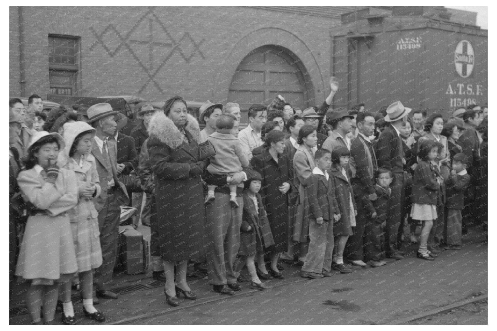 Japanese - American Families Await Train in Los Angeles 1942 - Available at KNOWOL