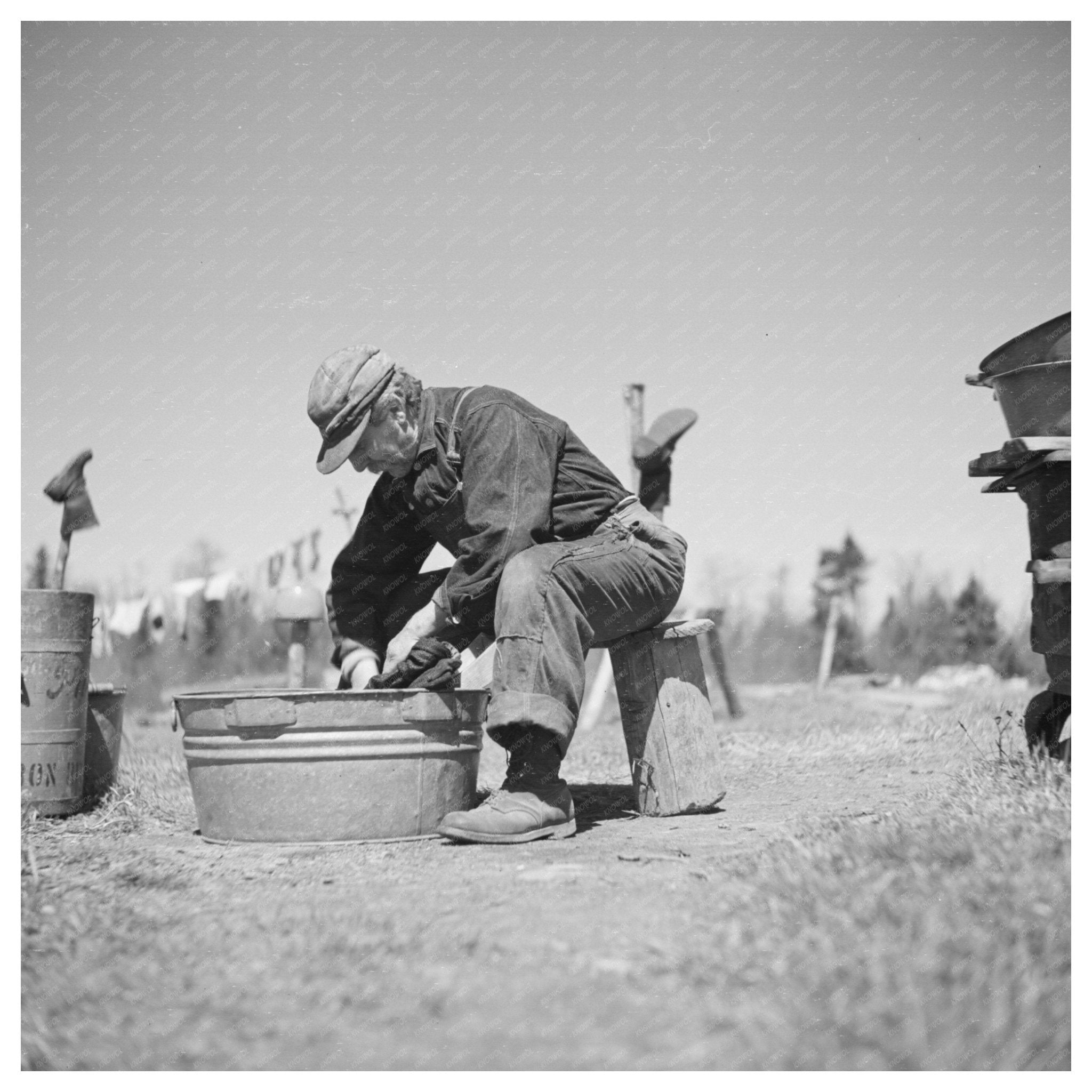 John Bastia Washing in Iron County Michigan 1937 - Available at KNOWOL