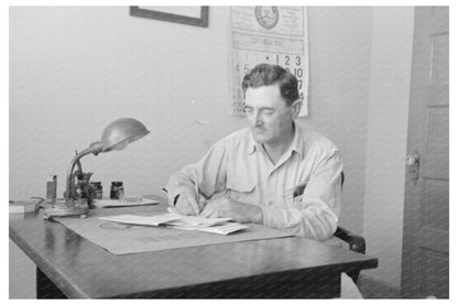 Joseph La Blanc Reading Mail at Desk Crowley Louisiana 1938 - Available at KNOWOL